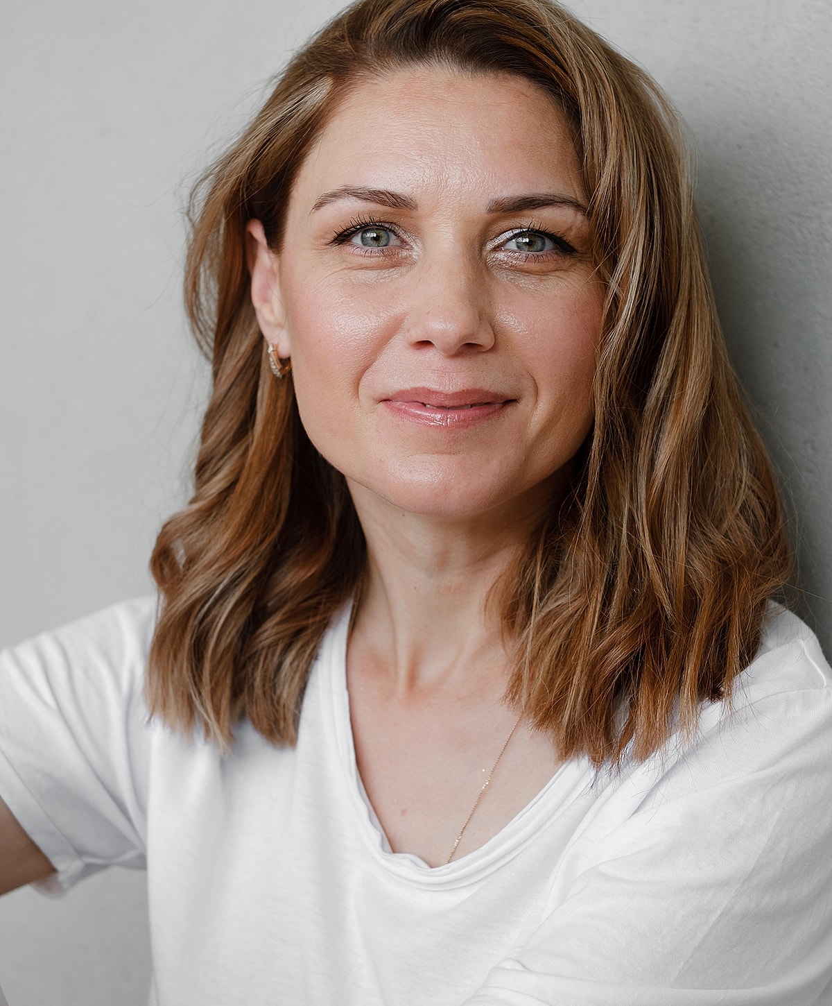 Doctor administering treatment to woman in clinic.