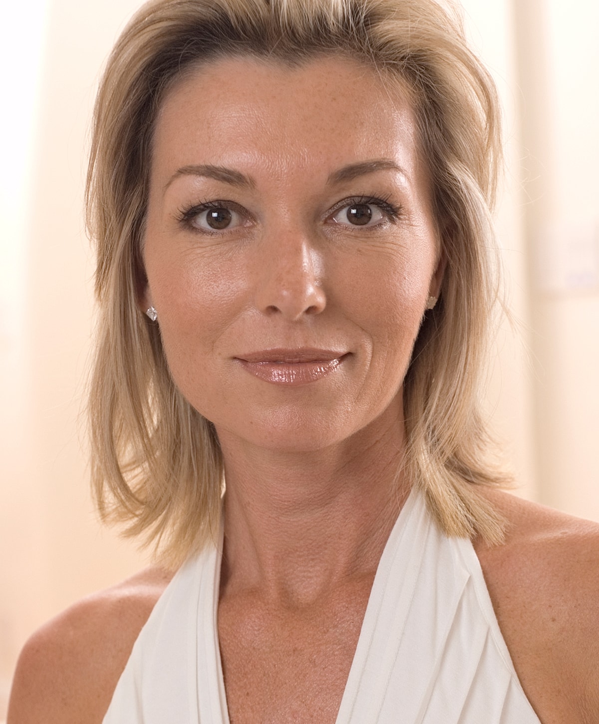 Close-up portrait of a woman with long hair.