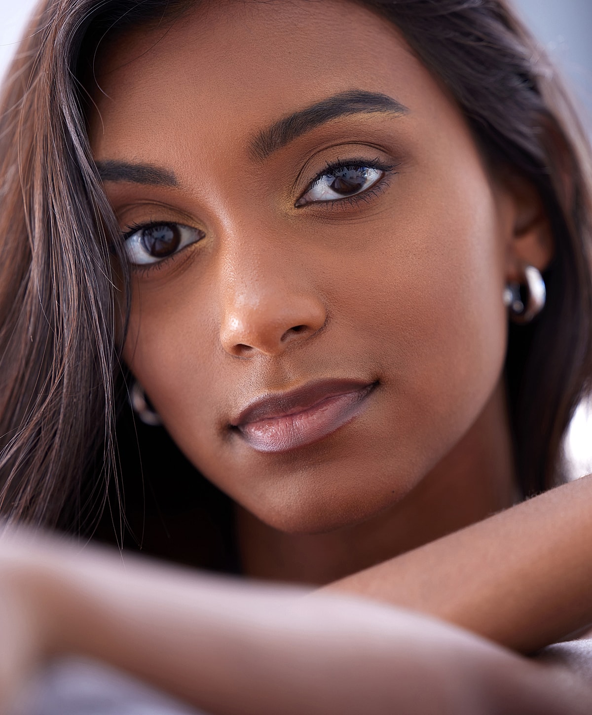 Doctor administering treatment to woman in clinic.