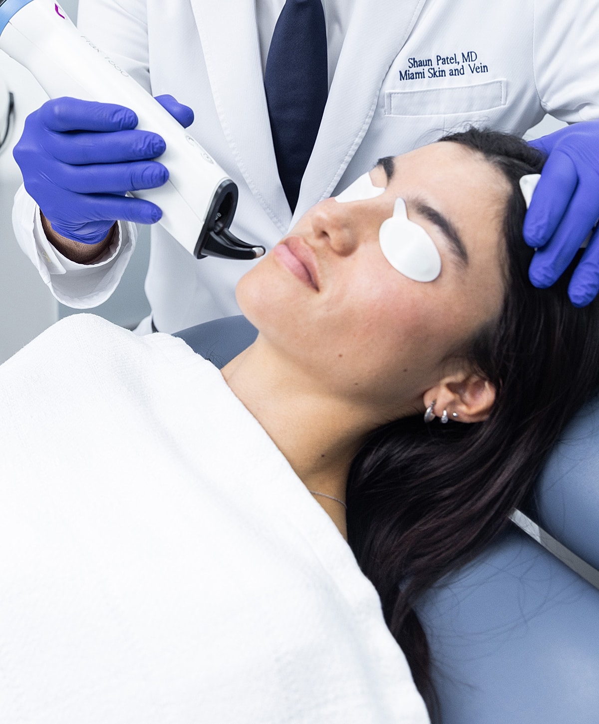 Professional man smiling in a business suit.