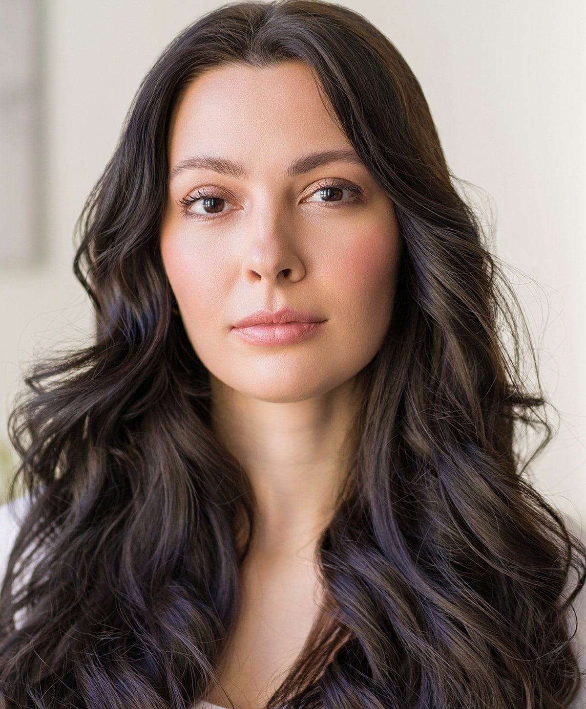Close-up of a woman with elegant beauty pose.
