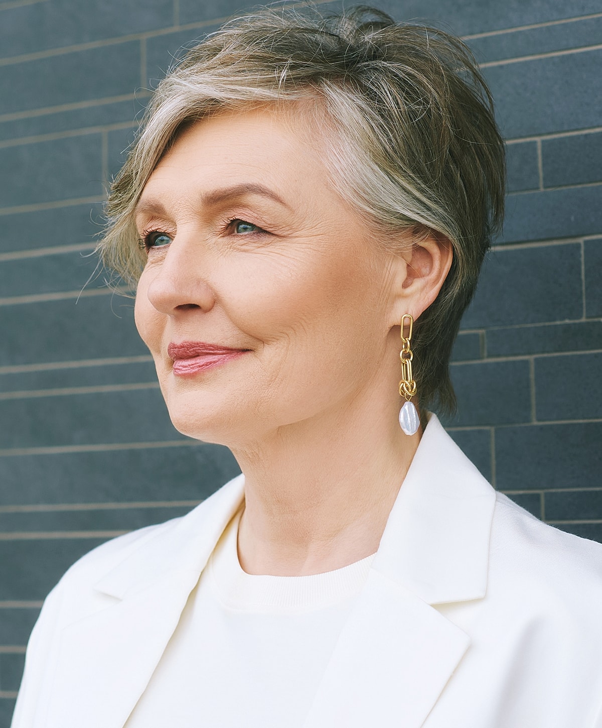 Doctor administering treatment to woman in clinic.