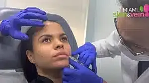 Cosmetic procedure using injectable treatment on patient.