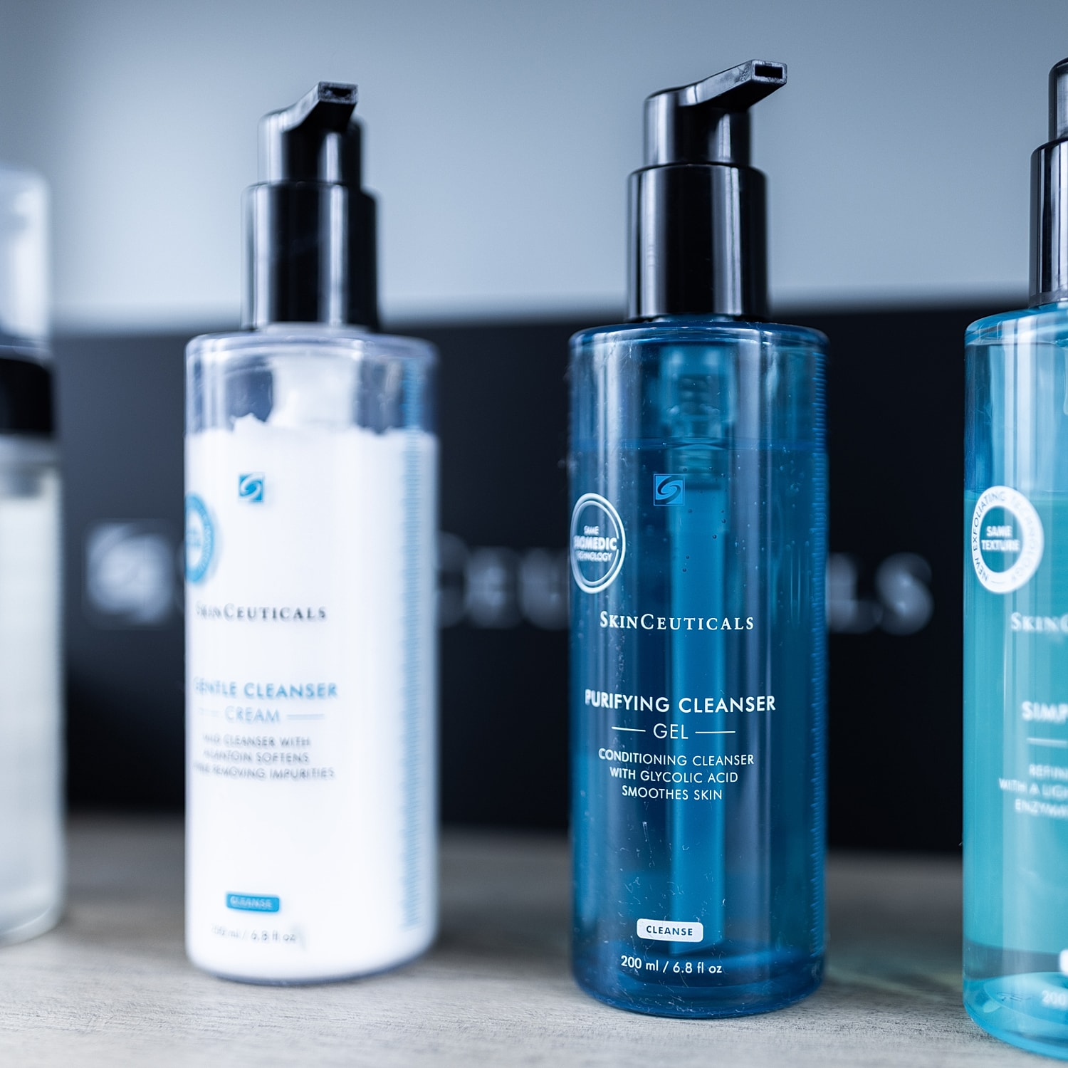 SkinCeuticals skincare cleansers on a shelf.
