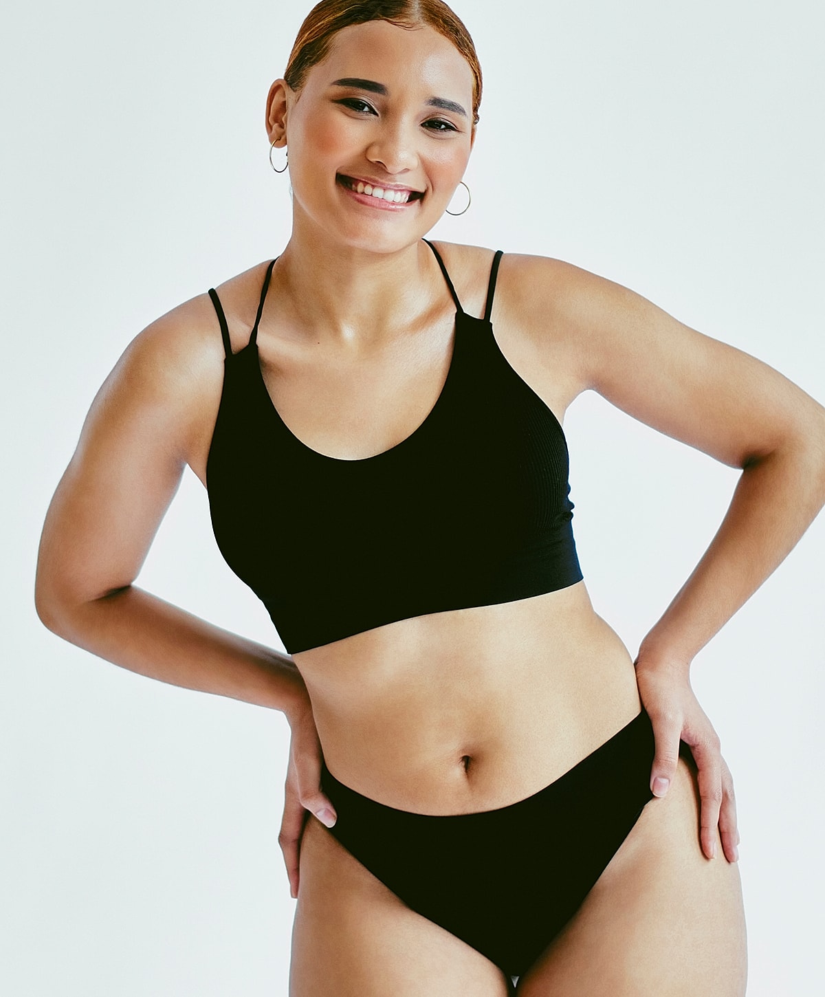 Doctor administering treatment to woman in clinic.
