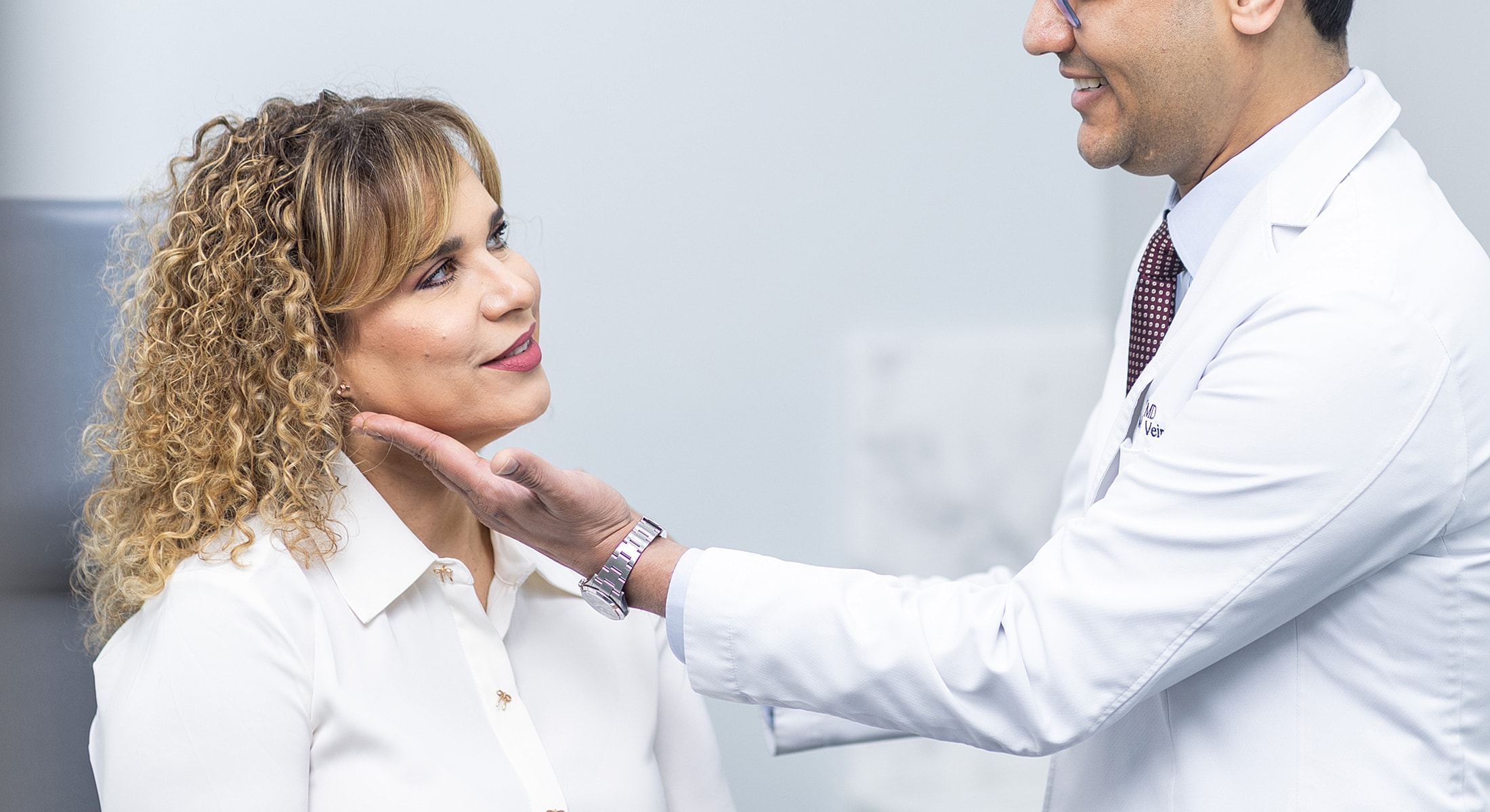 Doctor consulting with patient in medical office