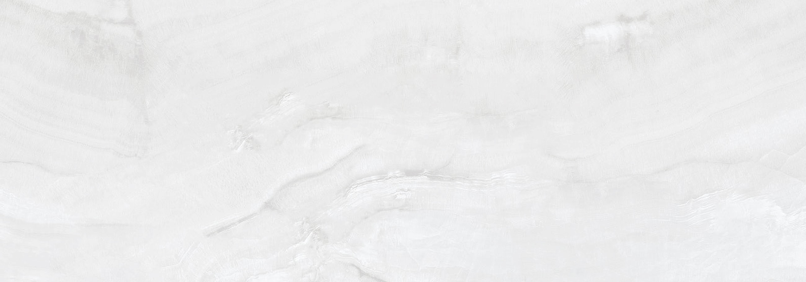White marble texture with subtle gray veins.