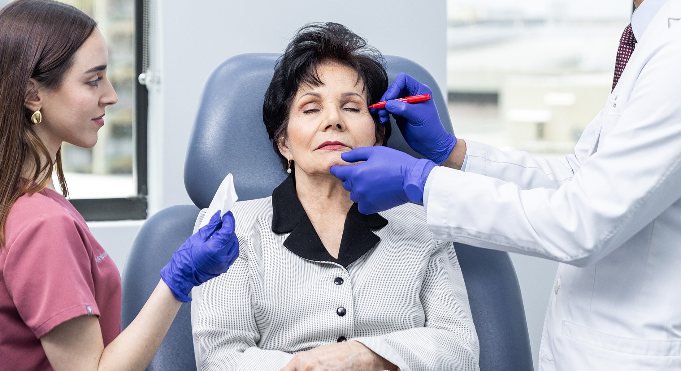 Patient receiving cosmetic treatment in clinic setting.